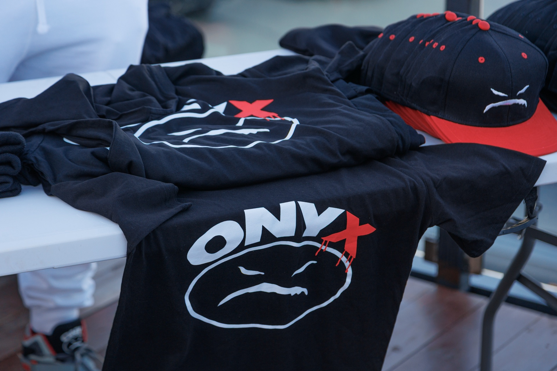 ONYX event merchandise and cap